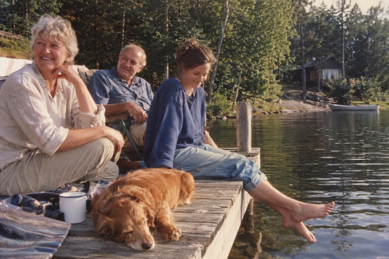A fictional family relaxes at the lake in the sample LifeReplay story.